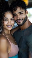 Young African American couple sharing intimate moment with genuine smiles. Close-up portrait showing natural curly hair and casual athletic wear. Suitable for lifestyle and wellness content.