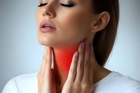 Young woman with sore throat holding neck in pain, red inflammation area highlighted. Medical symptom visualization for healthcare and disease awareness.