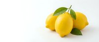 Fresh yellow lemons with green leaves isolated on white background for culinary design and healthy food concepts.