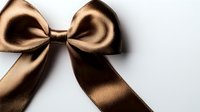 Elegant bronze satin bow with symmetrical loops and tails isolated on white background. Decorative element for gift wrapping, fashion accessories and holiday decor.