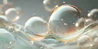 Translucent soap bubbles floating in soft light with iridescent reflections creating dreamy atmosphere for wellness and beauty concepts.