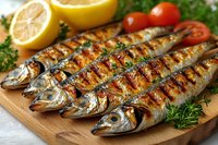 Grilled whole fish with lemon and herbs on wooden board, perfect for seafood restaurant menus, cooking blogs, and Mediterranean cuisine content.