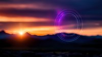 Mystical glowing neon circle portal floating over mountain silhouette at dramatic sunset with purple and orange sky. Sci-fi landscape background concept.