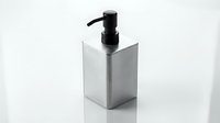 Modern stainless steel soap dispenser with black pump on white background isolated for bathroom and kitchen design projects.