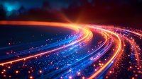 Abstract glowing light trails in vibrant orange, blue and purple colors against dark background, creating dynamic motion effect for technology and communication concepts.