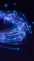 Glowing fiber optic cables with blue and purple light streams creating dynamic energy flow against dark background for technology and communication concepts.