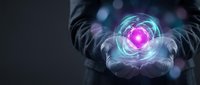Businessman hands holding glowing digital heart with futuristic holographic interface and neon lights on dark background for healthcare technology concepts.