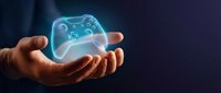 Glowing holographic gaming controller floating above cupped hands against dark background. Digital entertainment technology concept for modern gaming industry.