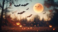 Spooky Halloween night scene with glowing full moon, flying bats silhouettes and blurred jack o lantern lights creating magical autumn atmosphere.