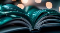 Open book pages with magical turquoise glitter sparkles and bokeh lights creating dreamy atmosphere. Close up macro shot for fantasy and education concepts.