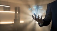 Businessman in suit holding glowing SaaS analytics and cloud integration holographic icons, representing digital transformation and modern software solutions.