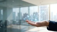 Business professional hand presenting holographic data visualization with growth charts and analytics in modern office environment for corporate presentations.
