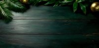 Dark green wooden background with palm leaves and golden Christmas ornaments creating festive tropical holiday atmosphere. Moody lighting adds dramatic effect.