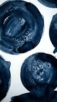 Abstract navy blue watercolor circles with organic textures and paint splatters on white background for modern art projects and contemporary design.