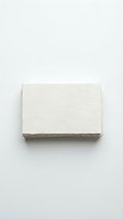Stack of blank white textured paper cards on neutral background for mockup design projects and branding presentations.
