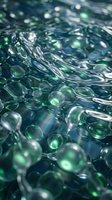 Abstract liquid surface with floating green and blue bubbles creating dynamic ripples and reflections for modern design backgrounds.