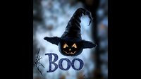Spooky black pumpkin wearing witch hat with glowing eyes and purple sparkly Boo text on misty dark background for Halloween season decoration.