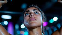 Young mixed race woman with glitter makeup and intense gaze looking up against blurred nightclub lights background, expressing confidence and glamour in nightlife setting.
