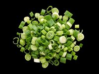 Chopped and sliced green onions isolated on transparent background, ready for culinary design, recipe graphics, food packaging, cooking blogs, restaurant menus, and print-on-demand kitchen products.