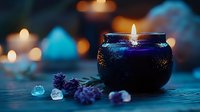 Glowing black candle with purple lavender flowers and healing crystals on dark wooden surface, creating mystical spa atmosphere with bokeh lights.