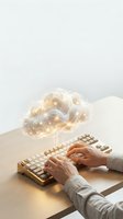 Hands typing on keyboard with glowing cloud computing network connections above representing digital transformation and data storage technology.