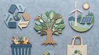Eco-friendly paper cut sustainability icons featuring recycling symbol, green tree, wind turbine, solar panel, and reusable bag on gray background.