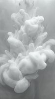 White smoke swirling gracefully against a soft gray background, creating an ethereal, flowing abstract texture for modern design projects.