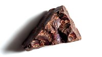 Chunk of raw copper ore mineral specimen isolated on white background, suitable for geology education, mining industry, science materials, and natural resource documentation.