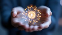 Glowing network sphere with golden light particles floating between cupped hands against dark background, representing digital transformation and innovation.