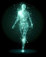 Glowing turquoise particle silhouette of human figure floating in dark space, composed of luminous dots and light effects creating ethereal atmospheric form.