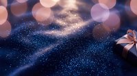 Festive galaxy background with sparkling stars and warm bokeh lights creating magical holiday atmosphere for seasonal celebrations and cosmic themes.