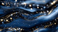 Abstract blue and gold flowing waves with sparkling glitter particles creating luxurious cosmic pattern for elegant backgrounds and premium design projects.