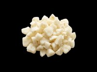 Pile of diced mozzarella cheese cubes isolated on transparent background, ready for food design, recipe graphics, cooking blogs, menu illustrations, and culinary print-on-demand products.
