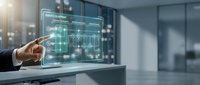 Businessman in dark suit pointing at holographic digital interface displaying network data and analytics in modern office environment with blurred background.