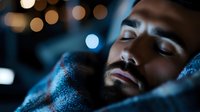Peaceful African American man sleeping comfortably in bed at night with soft bokeh city lights creating dreamy atmosphere for rest and relaxation concepts.