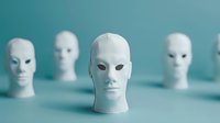 White mannequin heads arranged in row on turquoise background, center head in sharp focus while others blur into distance creating depth and minimalist composition.