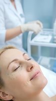 Middle-aged Caucasian woman receiving cosmetic injection treatment from medical professional in sterile clinic environment for anti-aging procedure.