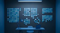 Digital data visualization displayed on wall screens above office desk with blue neon lighting, representing technology, analytics, and business intelligence solutions.
