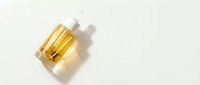 Luxury golden cosmetic serum bottle with dropper on white background, premium skincare product for beauty and wellness routines.
