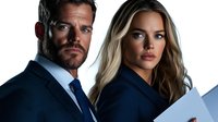 Professional business team in navy suits reviewing documents, confident executive portrait with serious expressions and modern corporate style.