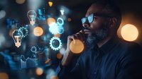 Thoughtful African American businessman analyzing digital innovation strategy with virtual light bulbs and gears, bokeh background creates futuristic atmosphere.