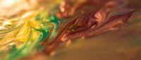 Abstract fluid art with vibrant golden yellow and emerald green paint swirls creating dynamic flowing patterns on canvas for modern interior design.