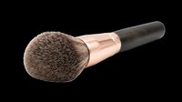 Makeup powder brush with rose gold ferrule and dark handle, isolated on transparent background. Great for beauty clipart, stickers, t-shirt design, and print on demand.