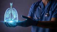 Medical professional in blue scrubs holding glowing holographic lungs projection for respiratory health education and pulmonary care concepts.