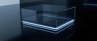 Futuristic transparent glass cube with glowing blue neon edges on dark surface. Modern minimalist design element for technology and innovation concepts.