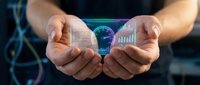 Hands holding holographic digital globe with data analytics charts and graphs floating above palms in futuristic technology concept for business intelligence.