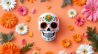 Mexican sugar skull with colorful floral pattern surrounded by fresh gerbera daisies in white, orange and pink on coral background. Day of Dead celebration concept.