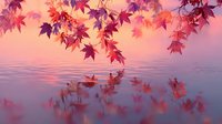 Vibrant red maple leaves hanging over calm water with reflections against a dreamy pink sunset sky.