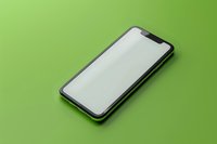 Modern smartphone with blank white screen displayed at angle on vibrant green background, minimalist mockup for digital product presentation and app design showcase.