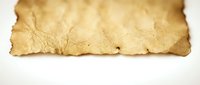 Aged parchment paper with worn edges and creased texture, suitable for vintage backgrounds, antique designs, historical documents, and retro creative projects.